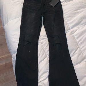 Risen pull on wide leg distressed jeans. Beautiful but bought twice by accident!